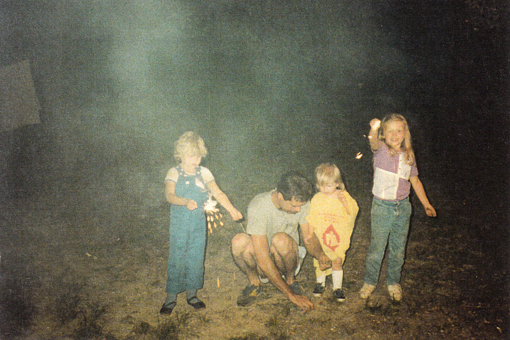 step dad and kids with sparklers