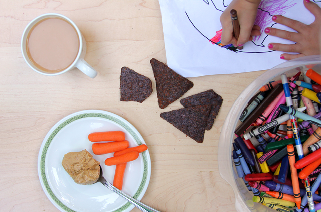 snacks carrots red hot blues coffee while kid coloring
