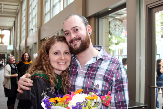 My husband and me after graduation