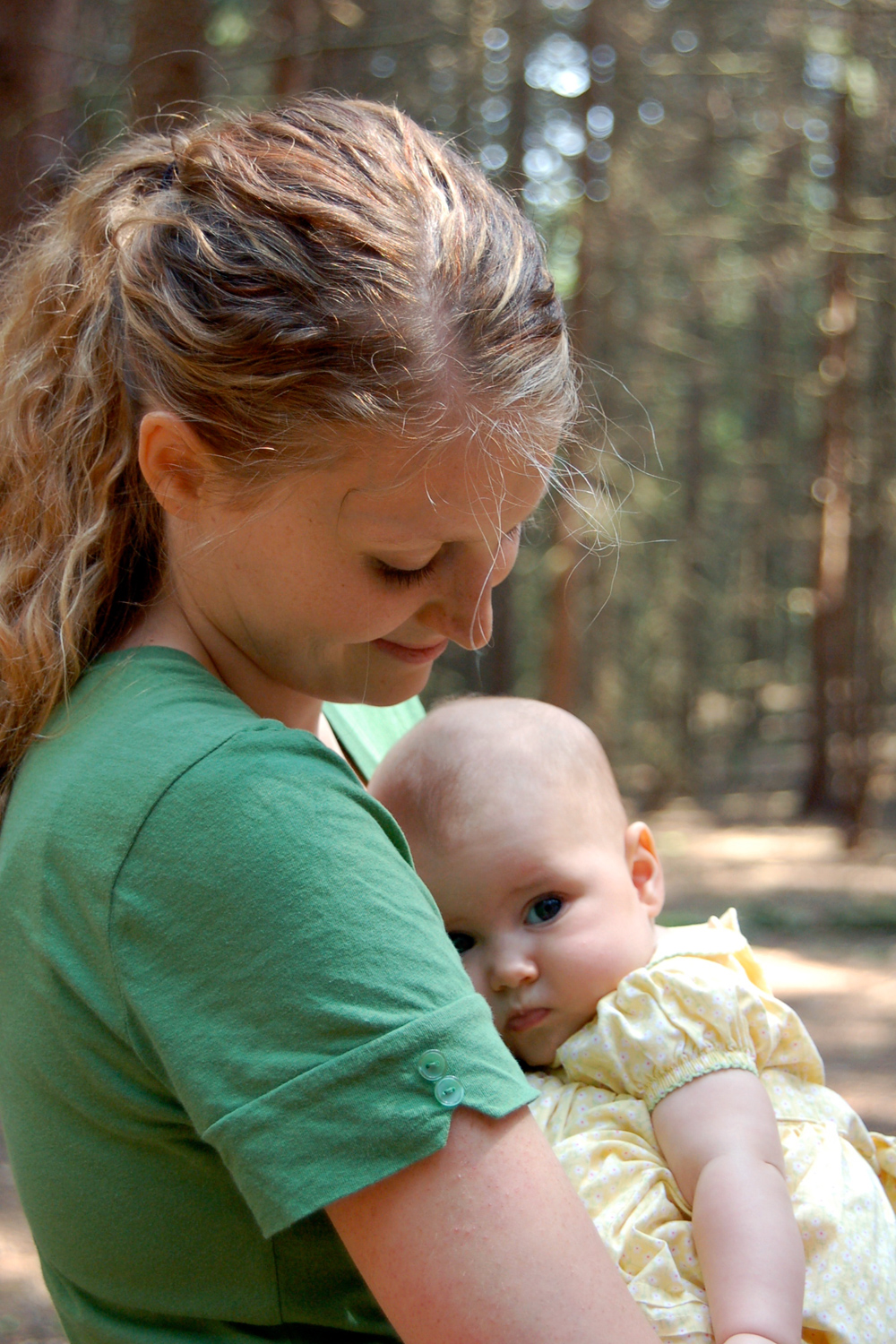 mom holding baby