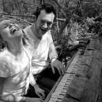 engagement photo laughing at piano