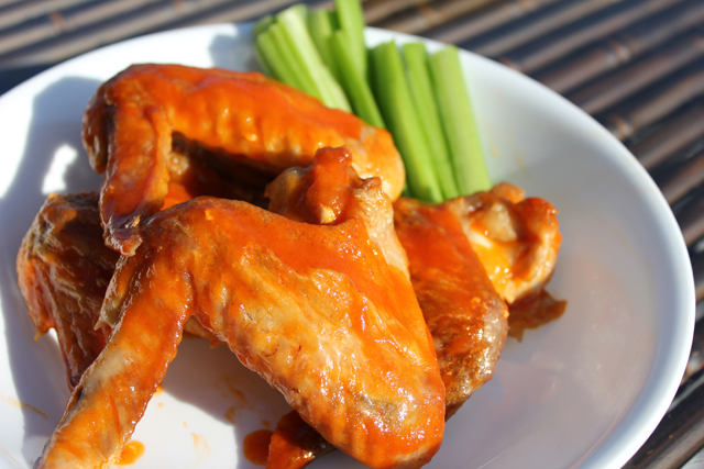 baked and broiled hot wings with celery