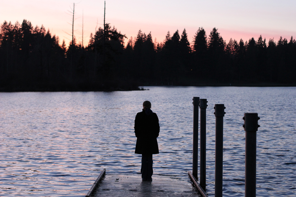 dock at sunset over lake