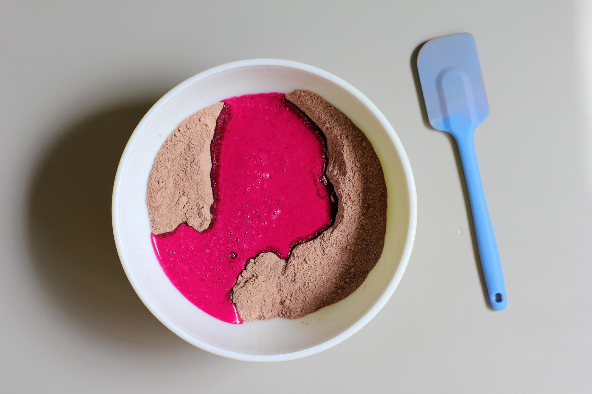 mixing chocolate beet cupcakes with chai frosting