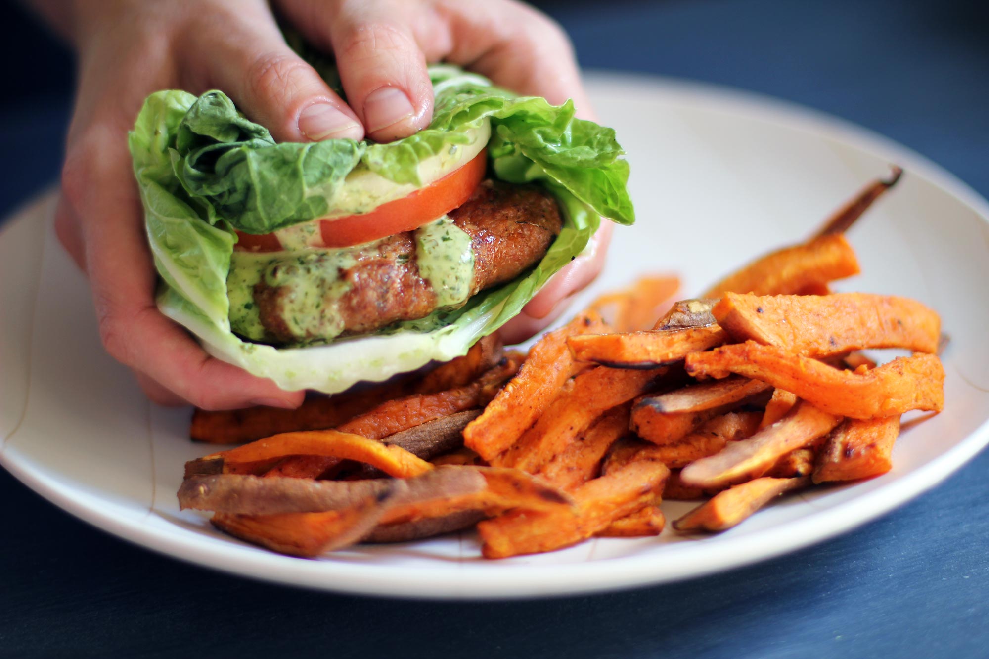 Red Thai Turkey Burgers with Cilantro Lime Aioli in a Napa Cabbage Wrap with sweet potato fries