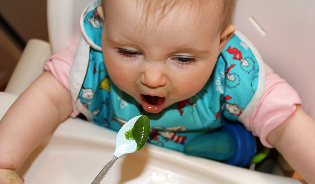 baby eating raw food