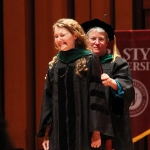 Dr. Archer Atkins getting her doctoral hood